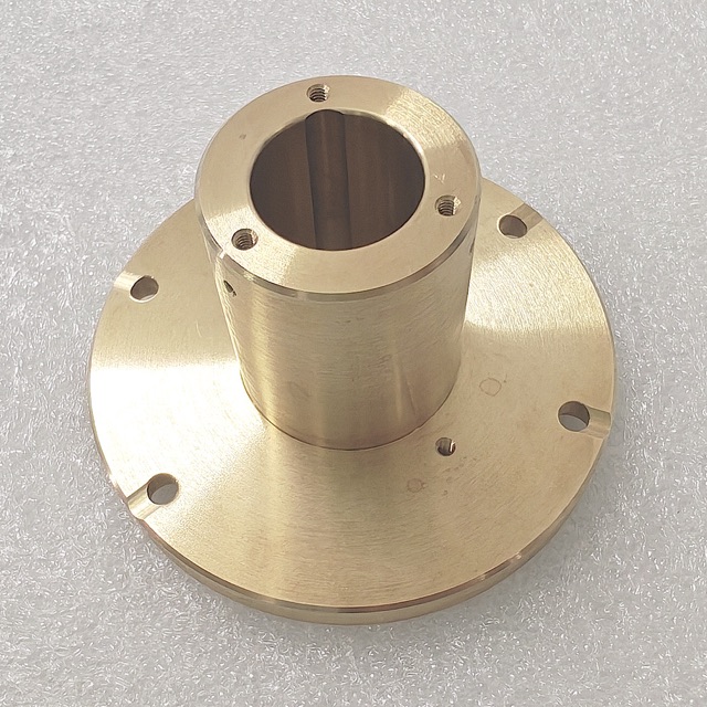 Custom copper precision component manufactured by Maisi Precision.