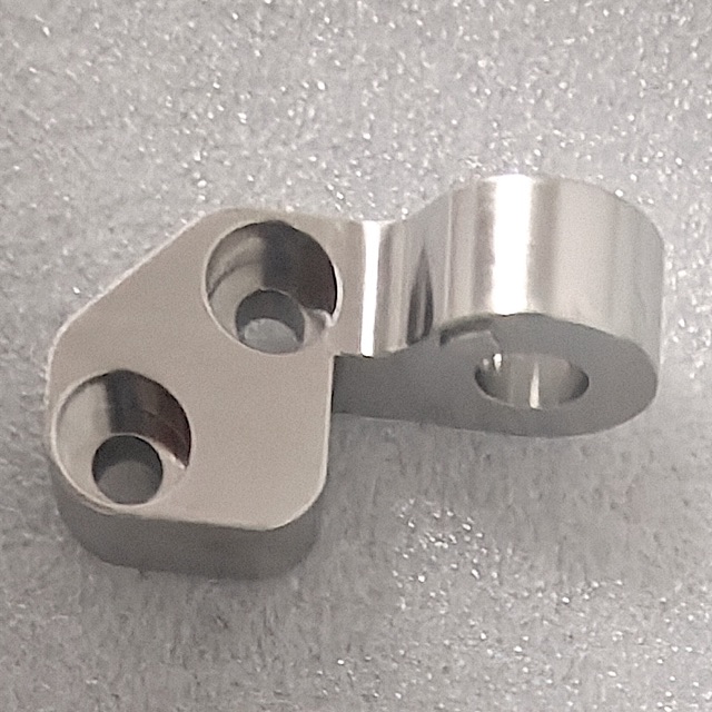 Custom stainless steel precision component manufactured by Maisi Precision.